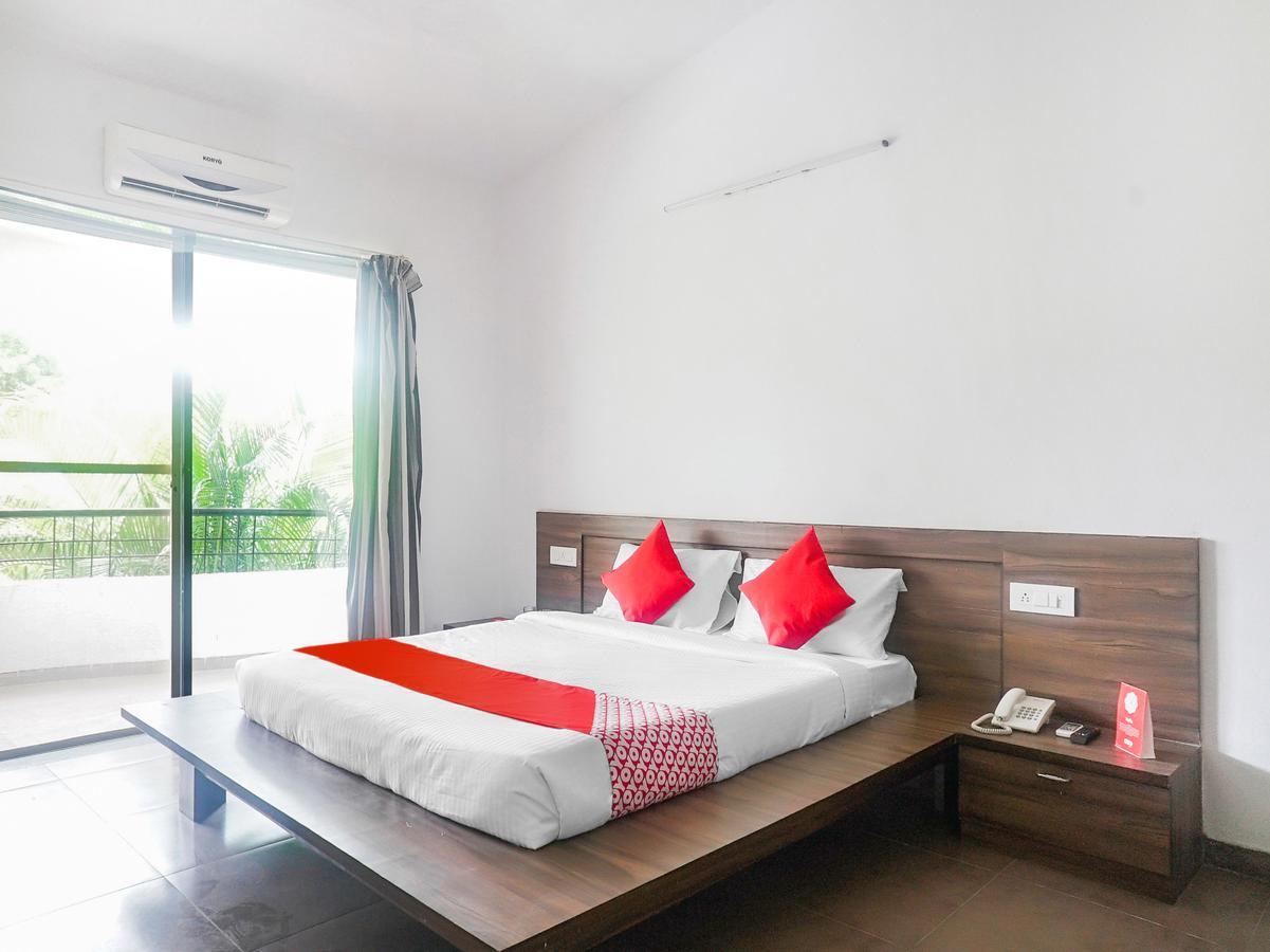 Oyo 15399 Olive Hotel