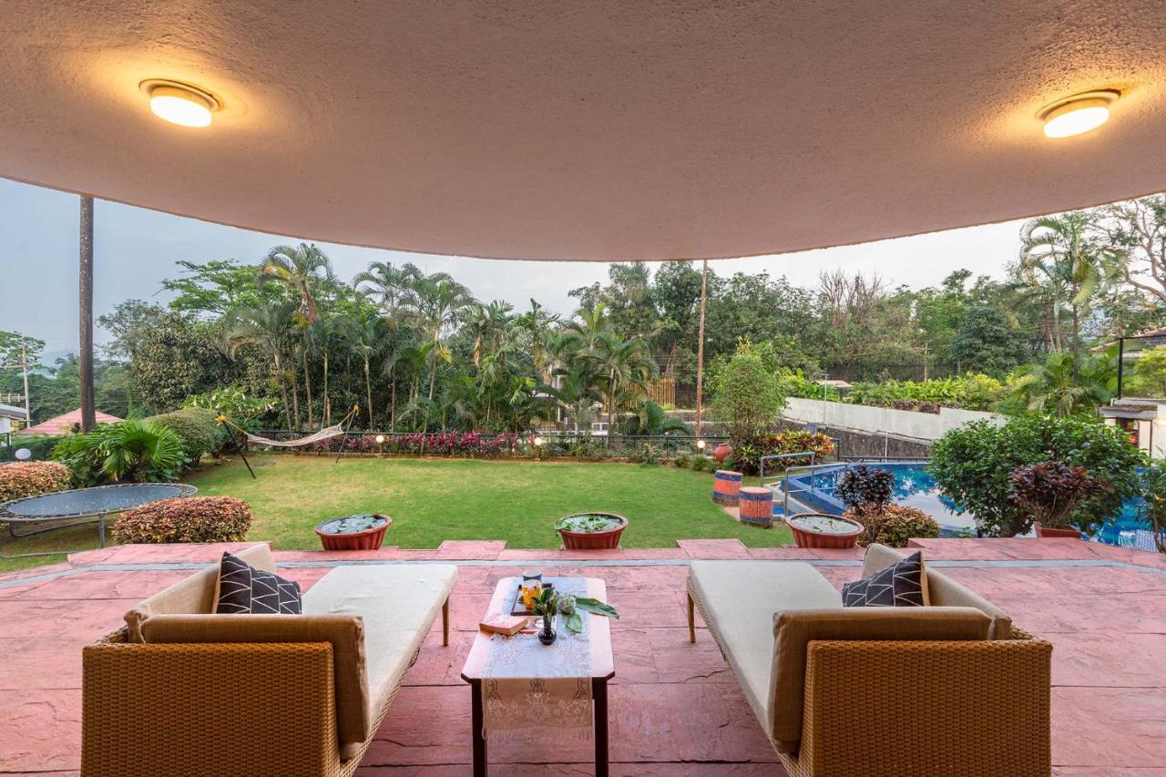Villa Stayvista's Shantam House - Dive Into Relaxation With A Pool And Tennis Lawn