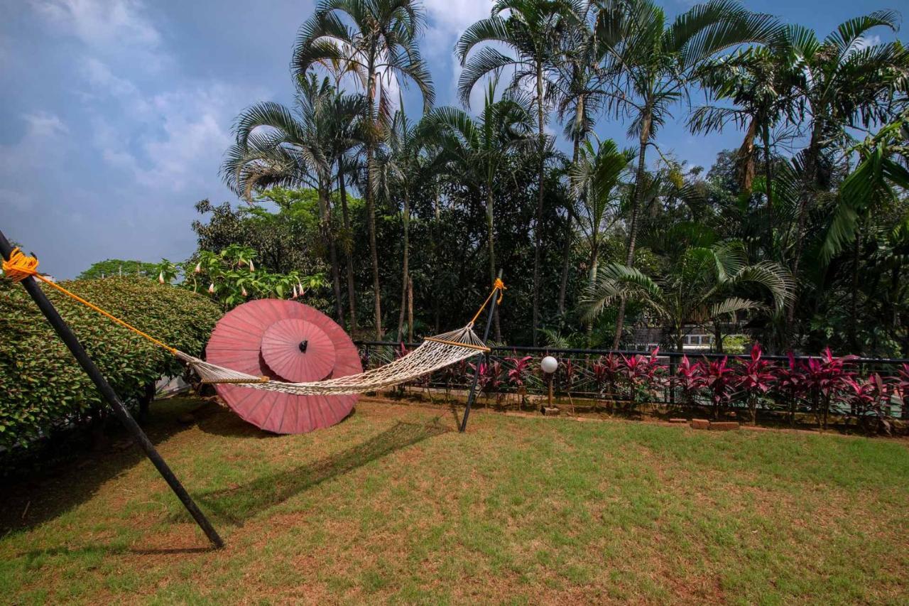 Stayvista's Shantam House - Dive Into Relaxation With A Pool And Tennis Lawn *