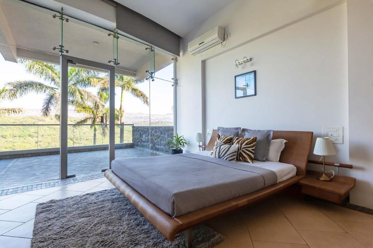 Villa Stayvista's Emerald Acres: Luxury Retreat With Heated Pool & Scenic Views Lonavala